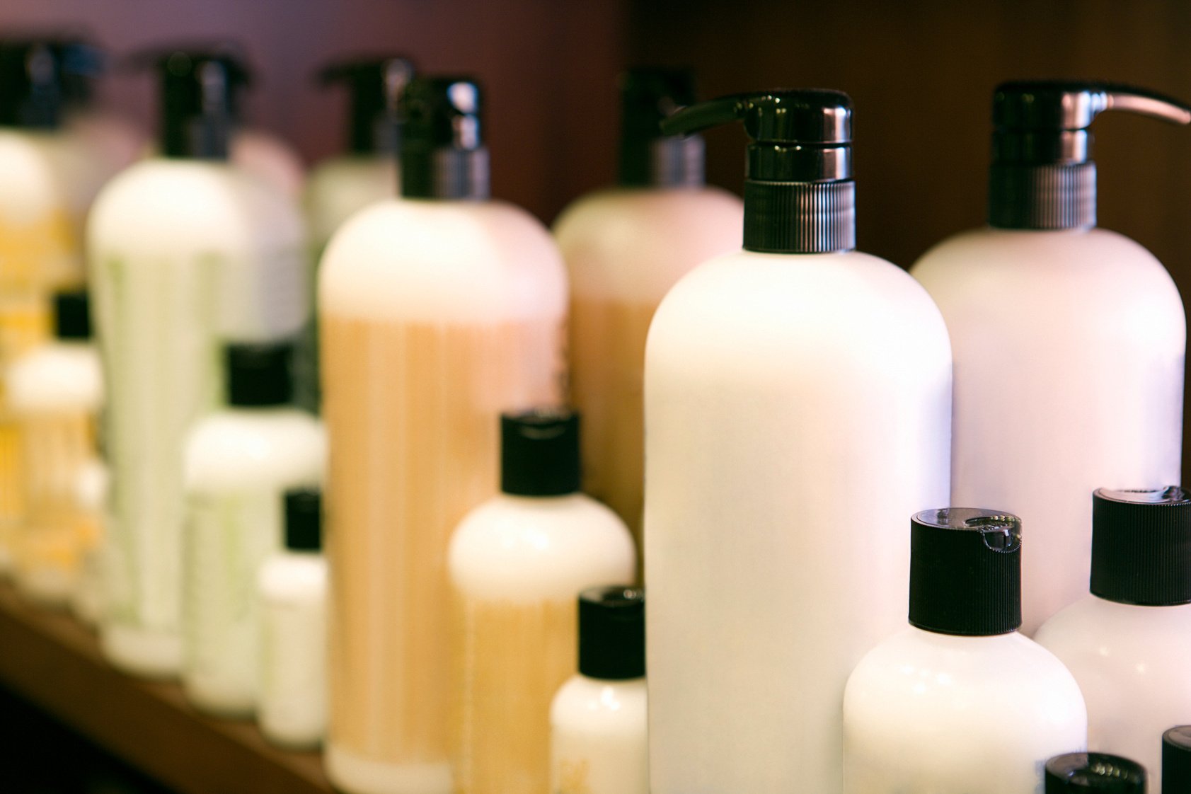 Hair and skin care products on display shelf